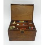 A mahogany sewing box fitted with a sectional tray.