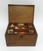 A mahogany sewing box fitted with a sectional tray.