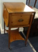 A 19th century faded mahogany pembroke work table, fitted with single deep drawer and candle slide.