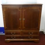 A mahogany television cabinet.