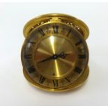 Jaeger, a gilt folding travel clock with mechanical movement in a ornate pierced gilt case, diameter