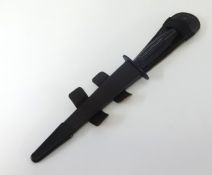 A modern Commando dagger and scabbard (no markings).