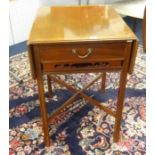 A early 20th century mahogany drop flap side table fitted with a single drawer and tray.