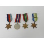 A set of WWII medals awarded to Mr.J.H.Dure (Salcombe, Devon) with original posting box.