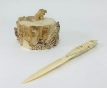 An Meiji Japanese carved ivory box decorated African scene, diameter approx 10cm together with an