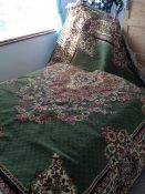 Persian style rug on green ground, width 168cm, length 220 cm.