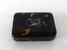 A Victorian tortoiseshell and silver inlaid purse, approx 65mm x 50mm.