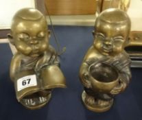 A pair of 20th century bronze Oriental figures of children, height 19cm (2).