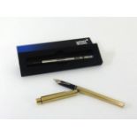 A Schaeffer fountain pen with 14k gold nib.