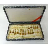 A carved ivory chess set possibly Chinese, height of King 10cm.