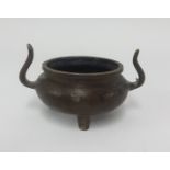 A small Chinese bronze censor, diameter 9.5cm, height 7cm.