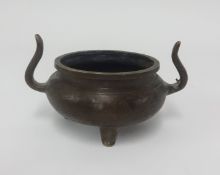 A small Chinese bronze censor, diameter 9.5cm, height 7cm.