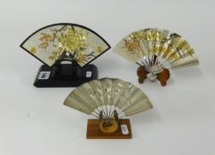 Three decorative Japanese silver fans.