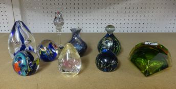 A collection of paperweights.