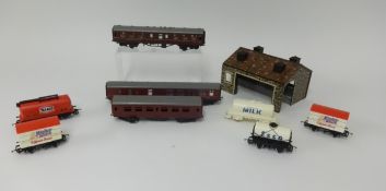 A collection of Tri-ang and Hornby model railway (mainly accessories), track etc.