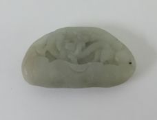 A Oriental small jade carving depicting dragons, length 6cm.