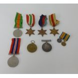 A pair of Great War and WWII medals awarded to Mr E.E.Atfield also two miniatures and original