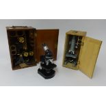 A 1950's brass microscope with mahogany box together with two other microscopes (3).