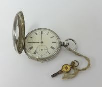 A white metal nickel open face half hunter key wind pocket watch in fitted case, marked 'Barraud &