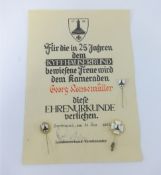 A 1962 German certificate together with three war veteran enamel badges.