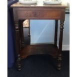 A 19th century rosewood reading stand, with rising lid, single drawer and lower tier, lacks hinges