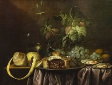 An reproduction oil on canvas Dutch School, still life, 'Grapes, Lemon, Oysters', 41cm x 52cm.