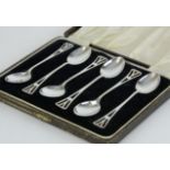 A set of six silver teaspoons of arts and crafts design, circa 1943, cased.