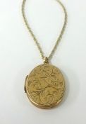 A 9ct locket and a 9ct fine chain, approx 11.50gms.