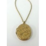 A 9ct locket and a 9ct fine chain, approx 11.50gms.