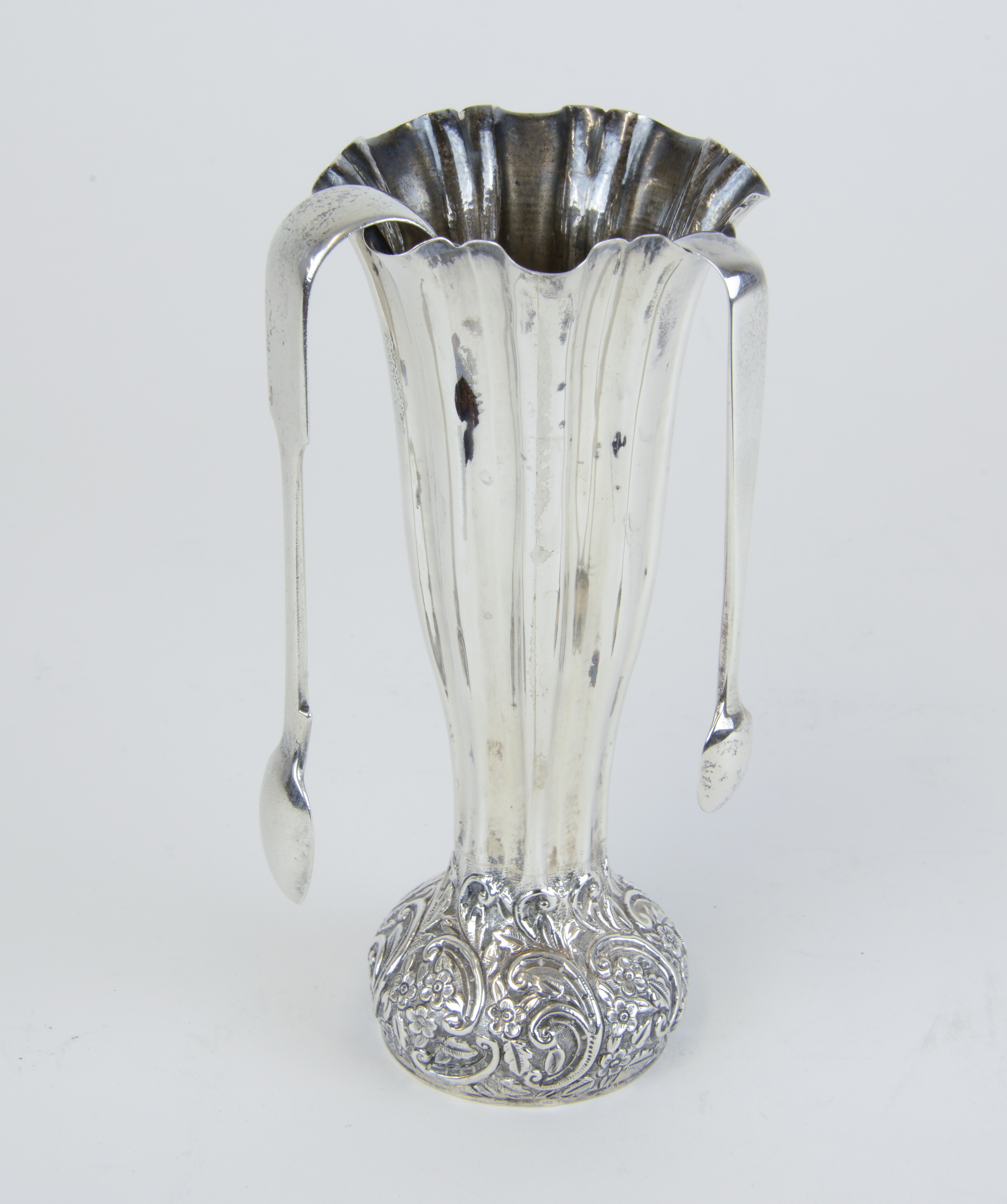 A silver spill vase, marked 'J.R.Ltd' with decorative base, a/f, together with two pairs of sugar