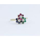 A 14ct multi stone cluster ring, marked '585', size N.