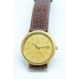 Omega, a gents gilt metal quartz De Ville wristwatch with date.