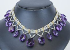 A rare early Victorian amethyst, pearl and gold collar necklace, set with 14 amethyst stones,