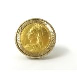 A Victorian 1892 half sovereign ring, set in a 9ct mount, size O.