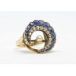 A half crescent ring set with sapphire and diamonds, size N, (possibly a brooch conversion).