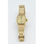 Rolex, a 9ct ladies Tudor bracelet watch, 19.90gms.