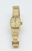 Rolex, a 9ct ladies Tudor bracelet watch, 19.90gms.
