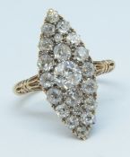 An good 18ct diamond marquise ring, size O.