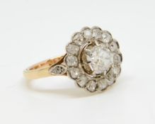 A fine antique French old cut diamond cluster ring, the centre stone approx 1.23cts, set in 18ct