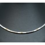 A 14ct diamond set collar of contemporary design.