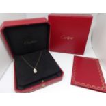 Cartier, an 18ct yellow gold necklace set with a mother of pearl set pendant, purchased new 2009