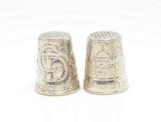 A pair of modern silver 'The Heritage Collection' thimbles.