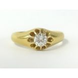 An 18ct diamond single stone ring, size T.