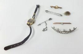 Six various brooches including a silver 'Torpedo' brooch, a 9ct opal bar brooch, a mourning brooch