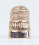 A 9ct gold thimble, maker 'CH', 5.20gms.