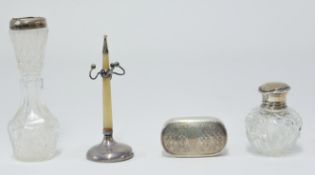 A Georgian silver and gilt snuff box marked 'SP', together with a silver top scent bottle, a ring