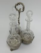 A three bottle decanter set.