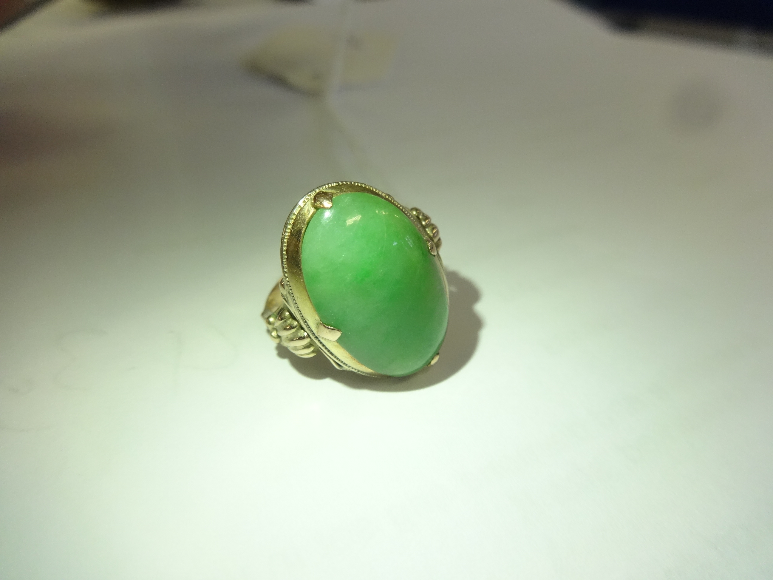 An antique jade set yellow gold ring marked '14k', size J, stone size approx 20mm x 10mm. - Image 2 of 5