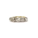 An antique five stone diamond ring, size H.