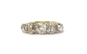 An antique five stone diamond ring, size H.